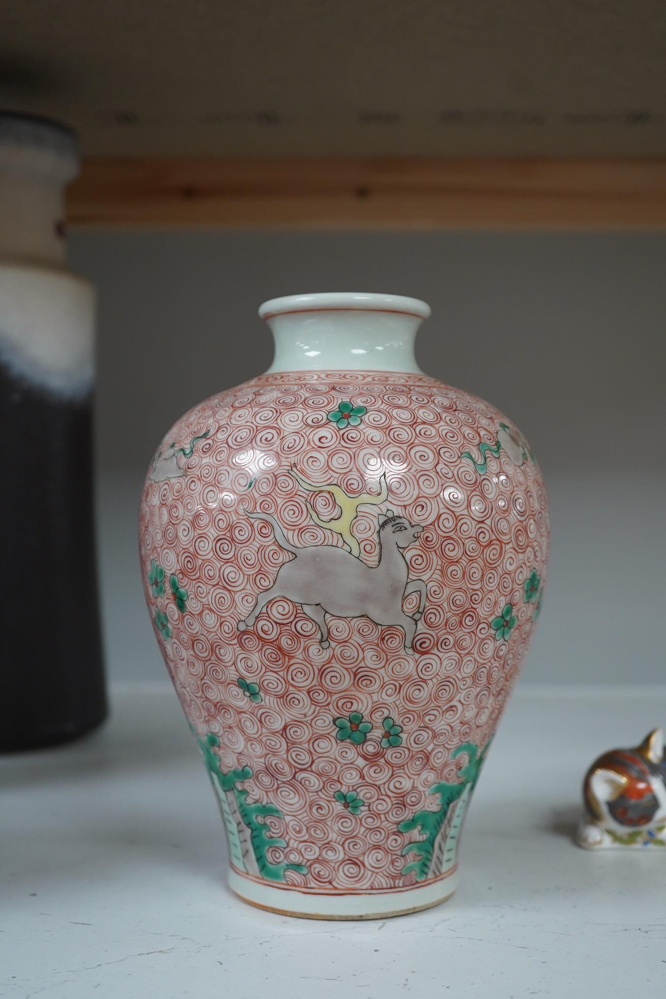 A Chinese famille verte jar, 19cm high. Condition - good